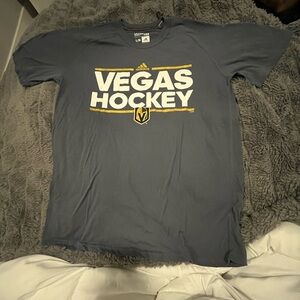 Women’s adidas large golden nights t-shirt.